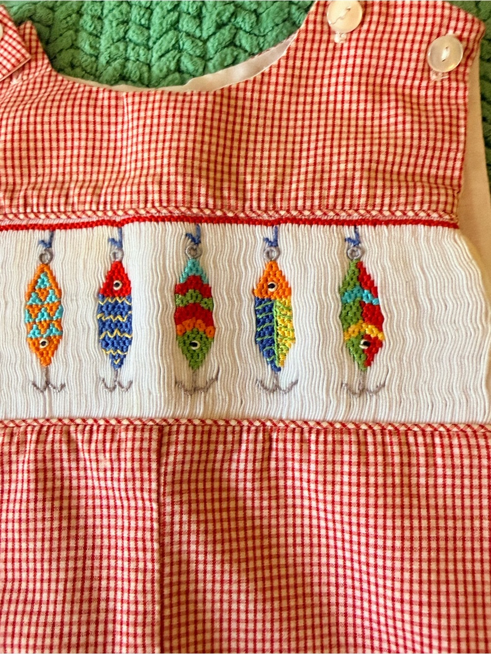Adorable Smocked Fishing lures on red check shortall. sz 18 mo